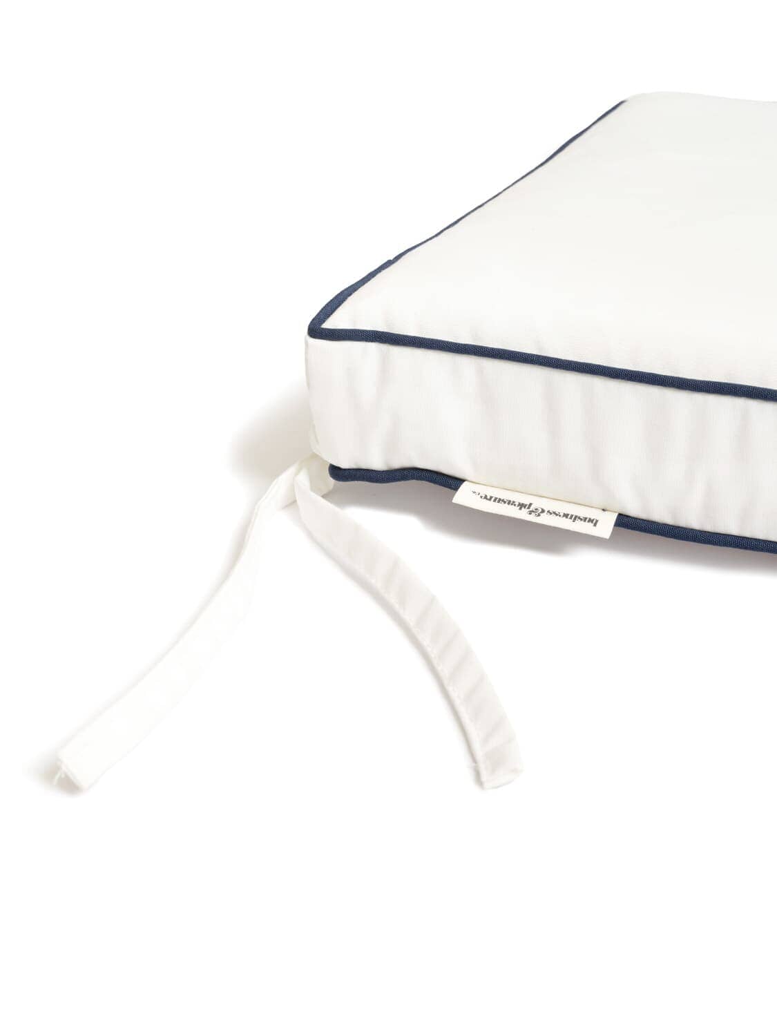 studio image of antique white bench pillow