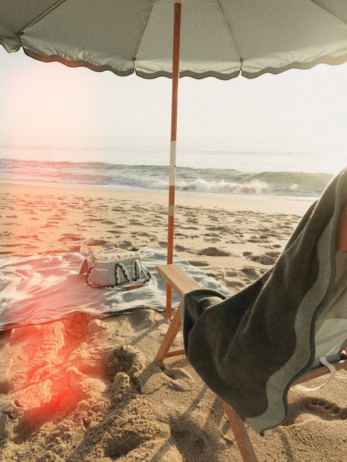 Beach set up with Riviera green umbrella, chair, towel & cooler