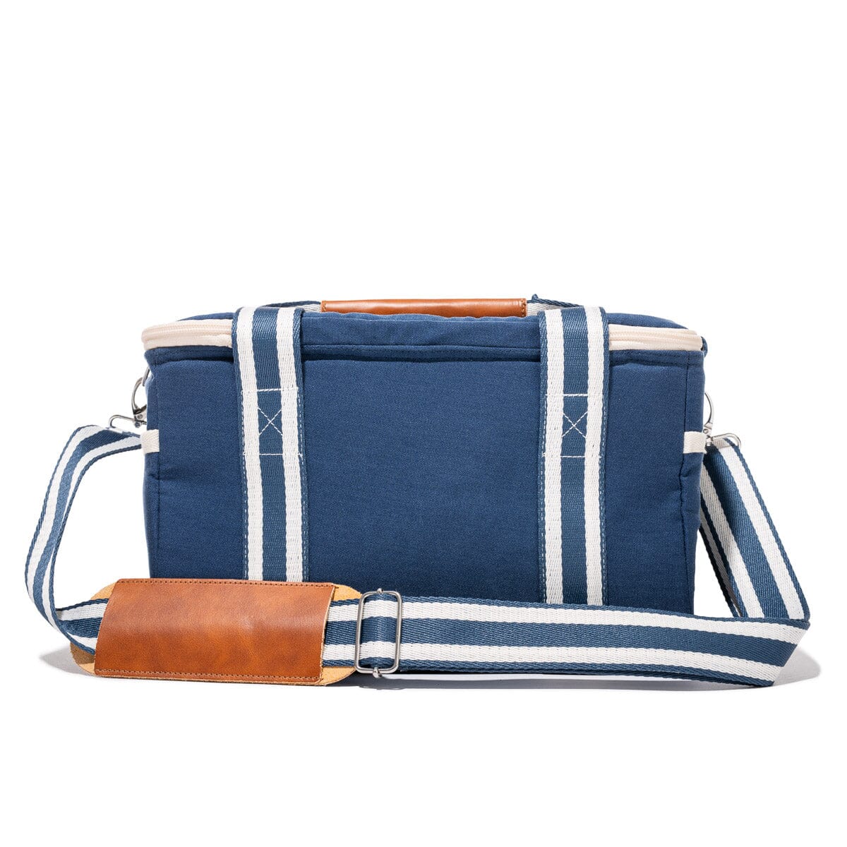 Blue and white striped bag with brown leather accents on a white background