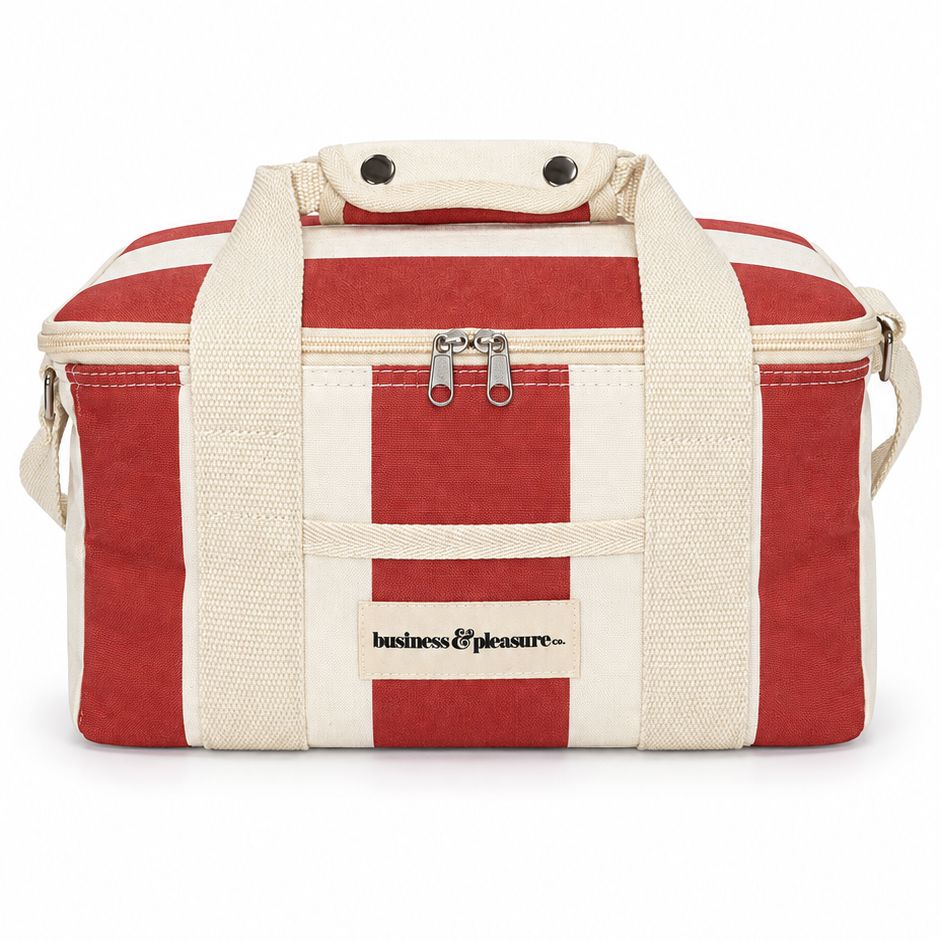 A red and cream striped canvas duffel bag with cream webbing handles and a front zipper pocket, shown on a plain white background.
