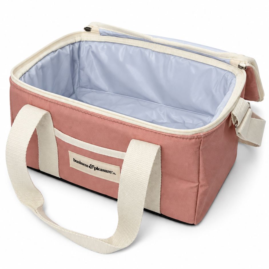 A pink and cream insulated tote bag with a light gray interior, shown open on a white background.