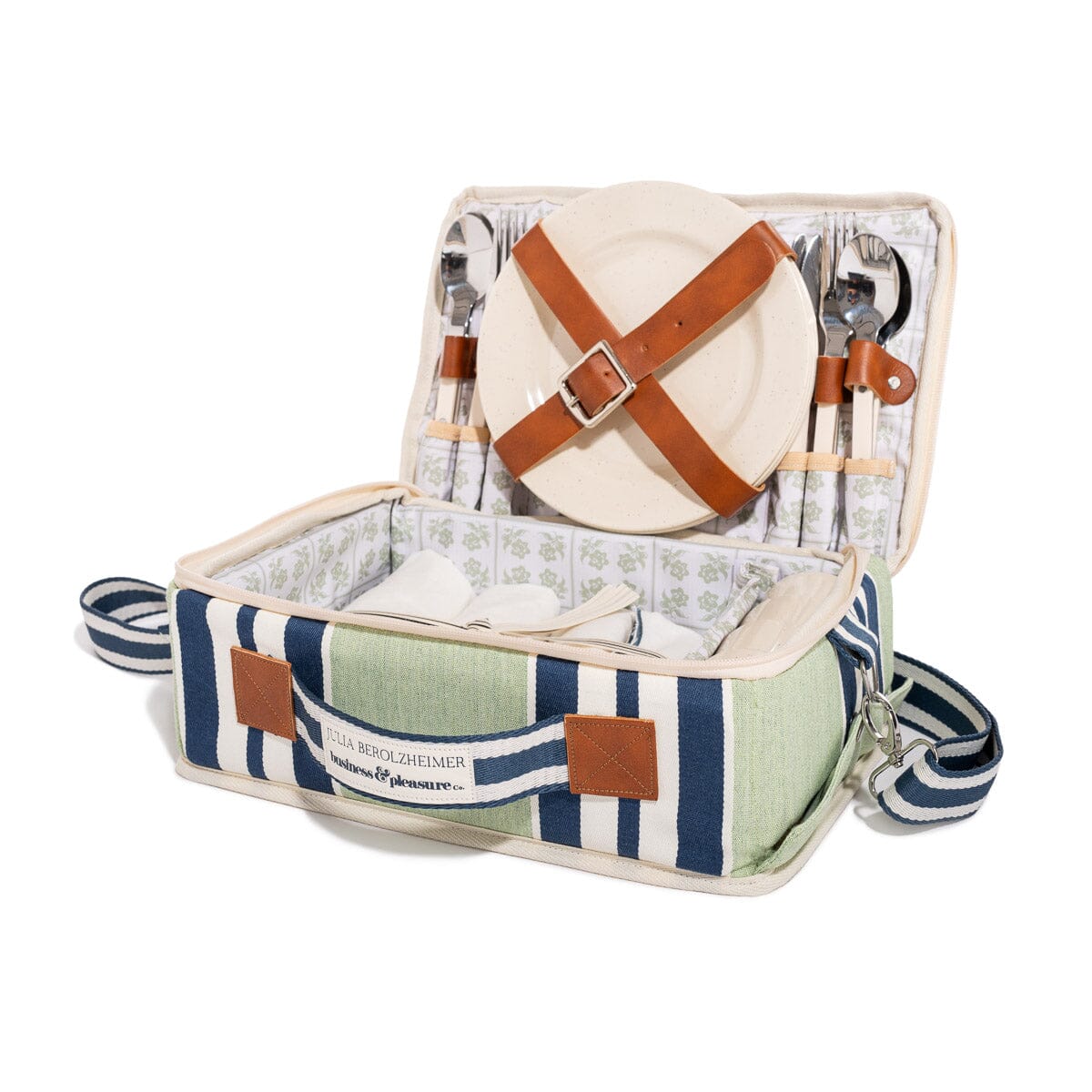 Picnic basket with cutlery and plates on a white background