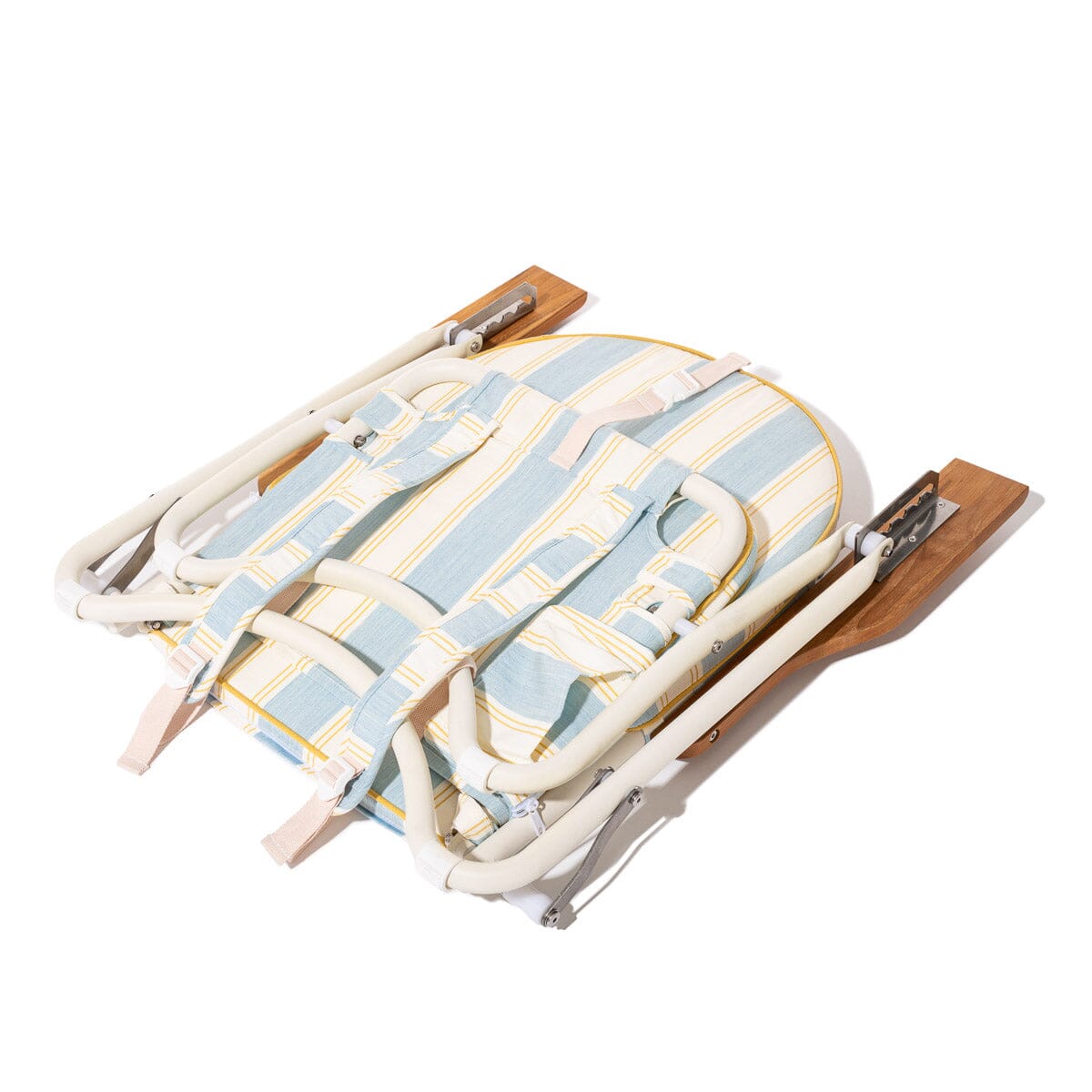 Foldable chair with plaid cushion on a white background