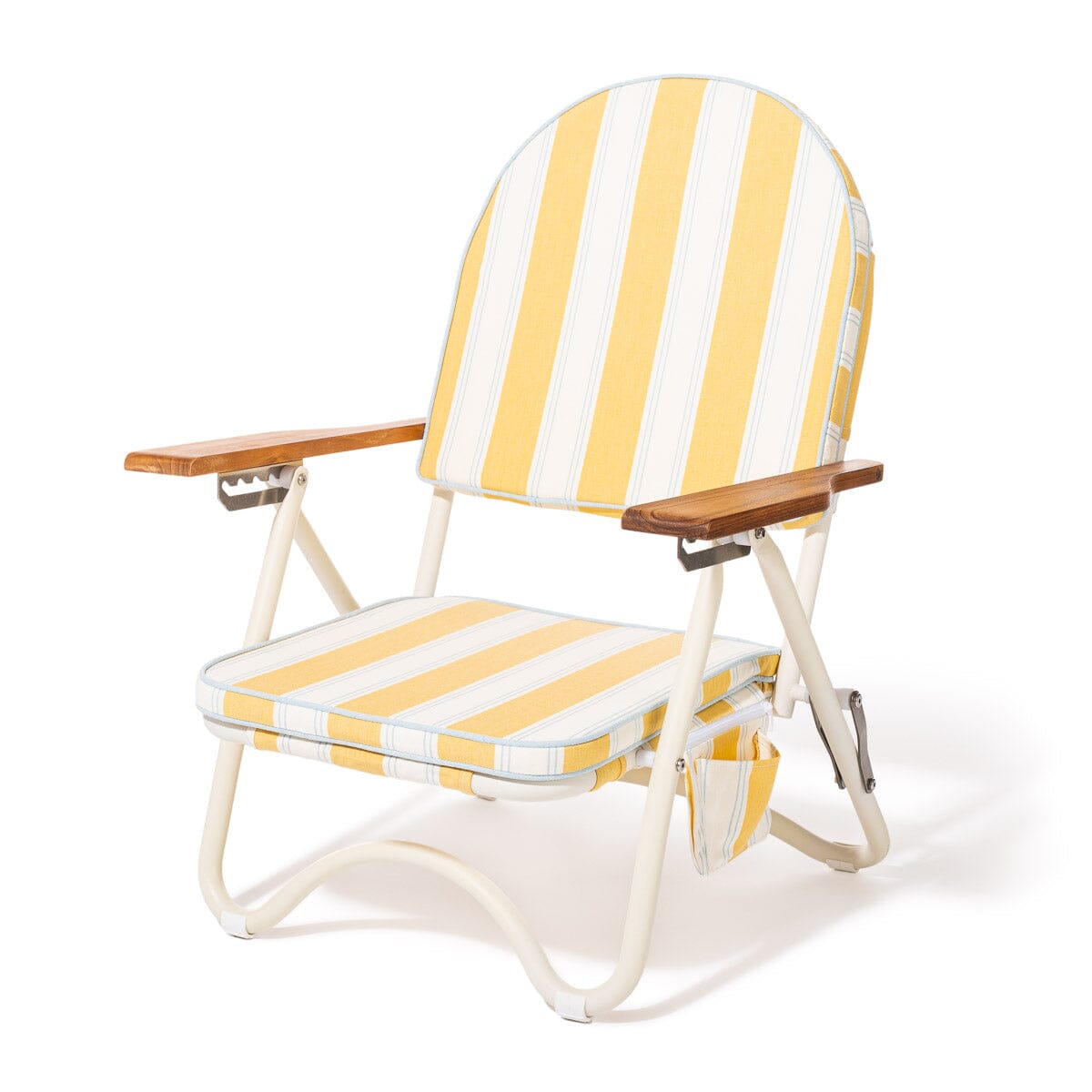 Yellow and white striped folding beach chair with wooden armrests on a white background