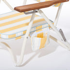 Close-up of a lounge chair with yellow and white striped cushions and a wooden armrest on a white background.