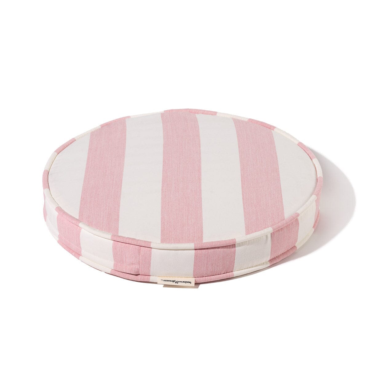 Product image of Round pink and white striped cushion on a white background
