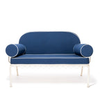 Blue sofa with cylindrical armrests on a white background