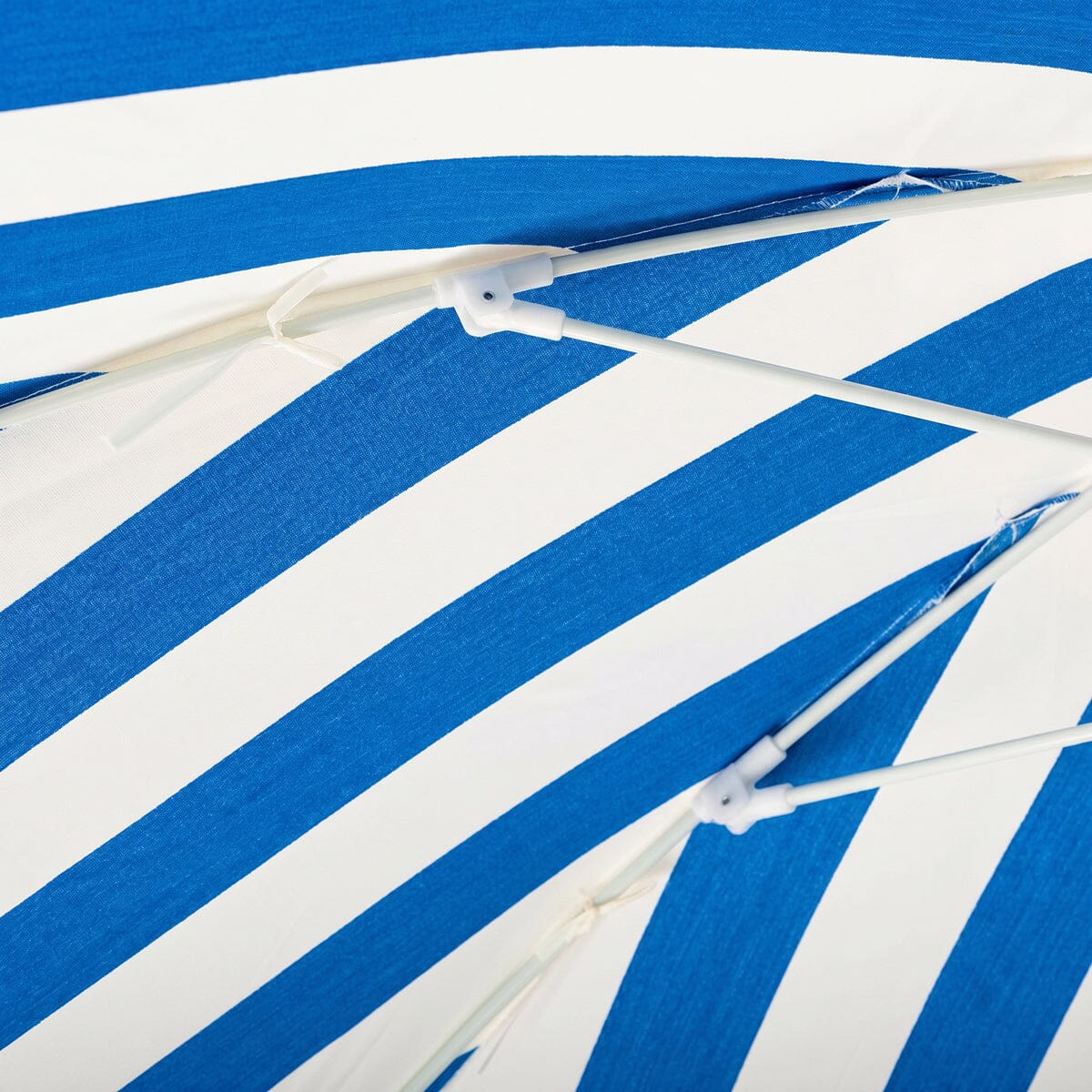 The Crew Mediterranean Blue Stripe Club Umbrella by Business & Pleasure Co with Antique White Pole and Metal Crank Tilt