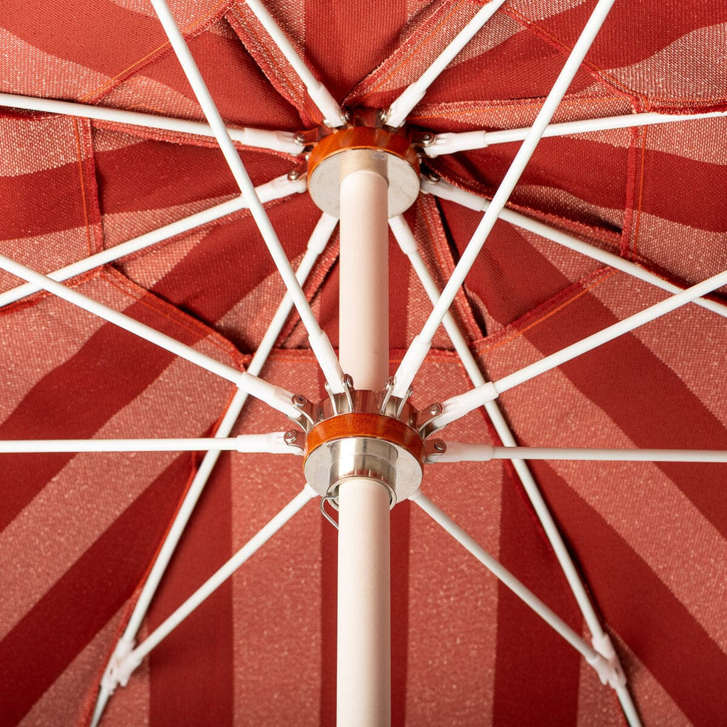 The Terry Terracotta Stripe Club Umbrella for both the beach and your patio or pool