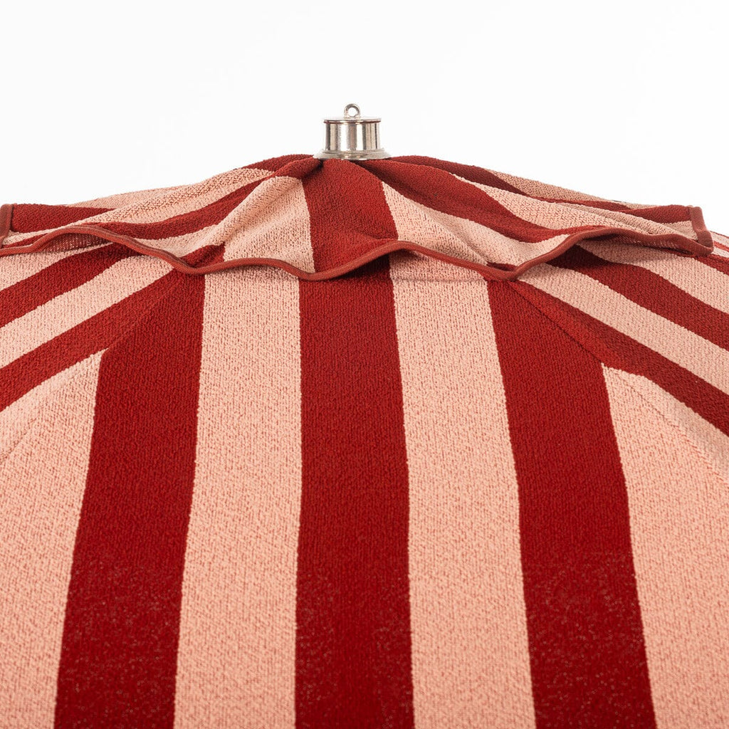 The Terry Terracotta Stripe Club Umbrella for both the beach and your patio or pool