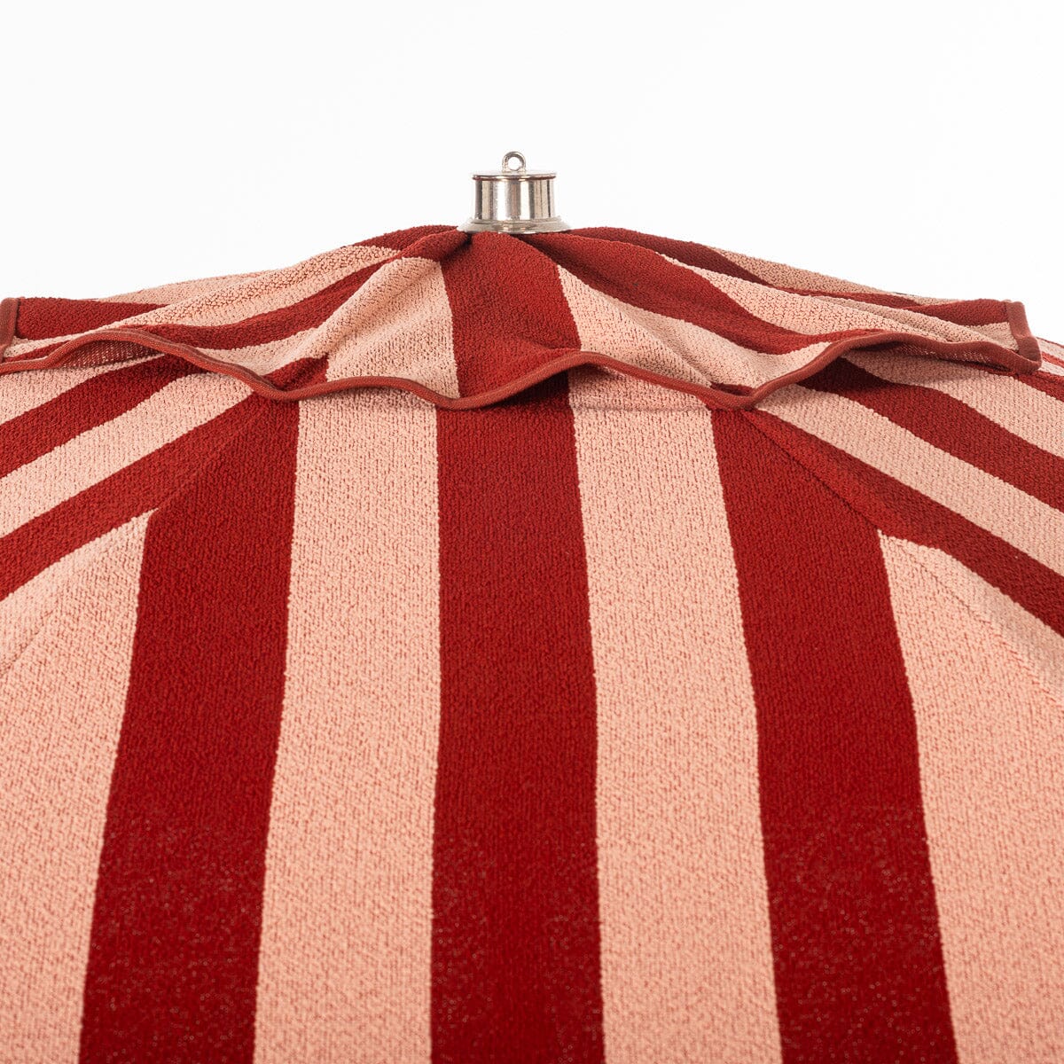 The Terry Terracotta Stripe Club Umbrella for both the beach and your patio or pool