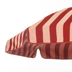 The Terry Terracotta Stripe Club Umbrella for both the beach and your patio or pool