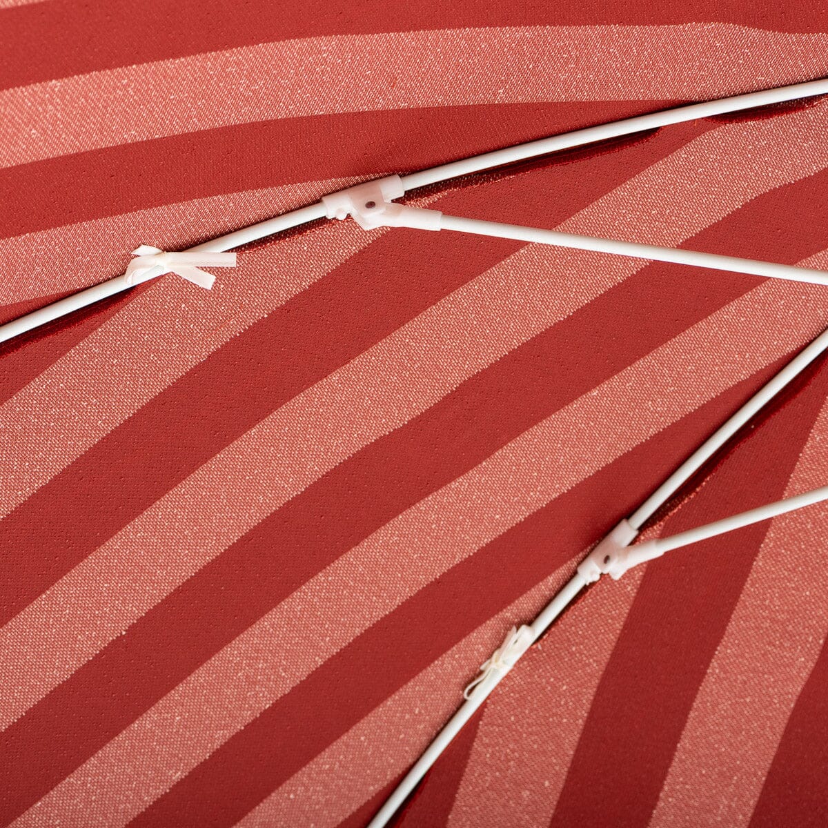 The Terry Terracotta Stripe Club Umbrella for both the beach and your patio or pool