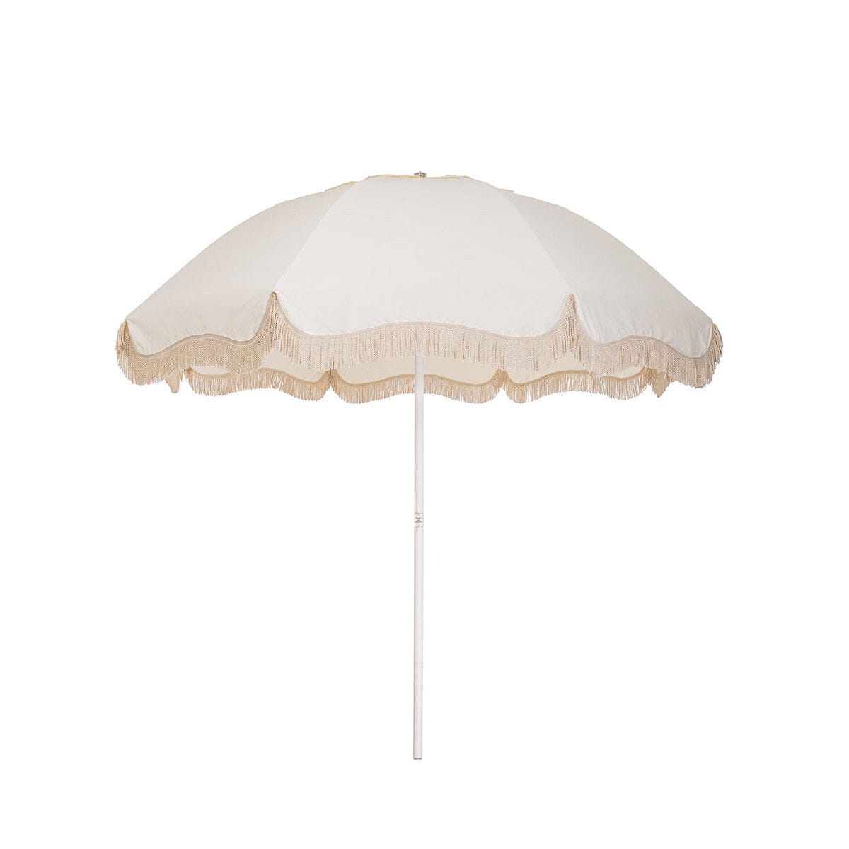 Business & Pleasure Co. Patio Umbrella in Antique White, featuring a dome-shaped ivory canopy with scalloped edges, cream fringe trim and a white center pole.
