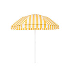 The Patio Umbrella by Business & Pleasure Co. in Crew Mimosa Yellow Stripe features equally spaced yellow and white stripes throughout the umbrella canopy, which is in a dome shape and on a white pole.