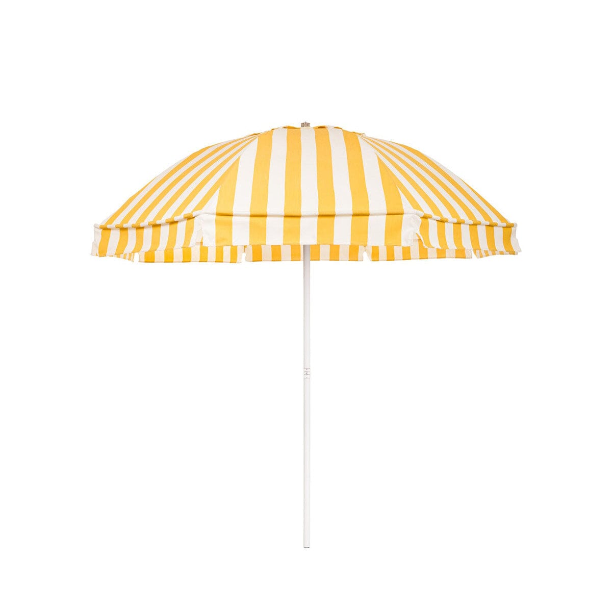The Patio Umbrella by Business & Pleasure Co. in Crew Mimosa Yellow Stripe features equally spaced yellow and white stripes throughout the umbrella canopy, which is in a dome shape and on a white pole.