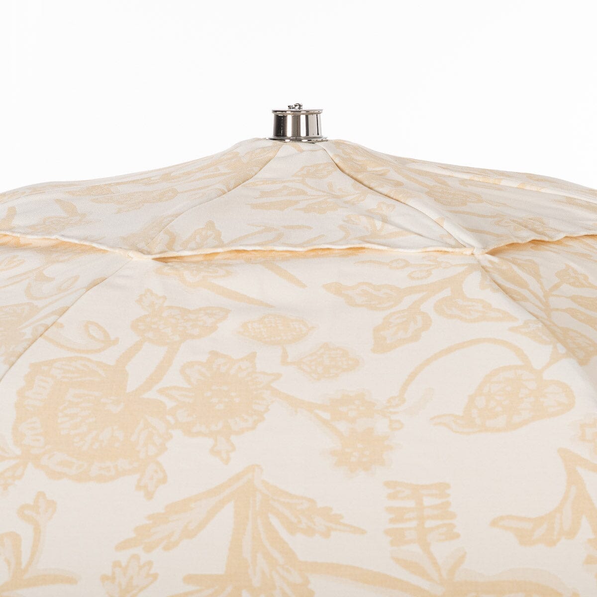Beige & white floral patio umbrella on a white background