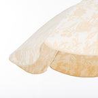 Beige & white floral patio umbrella with a scalloped edge on a white background