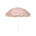 Business & Pleasure Co. Patio Umbrella in Laurens Pink Stripe, featuring a dome-shaped canopy with fine pink and white stripes, scalloped edges, cream fringe trim and a white center pole.