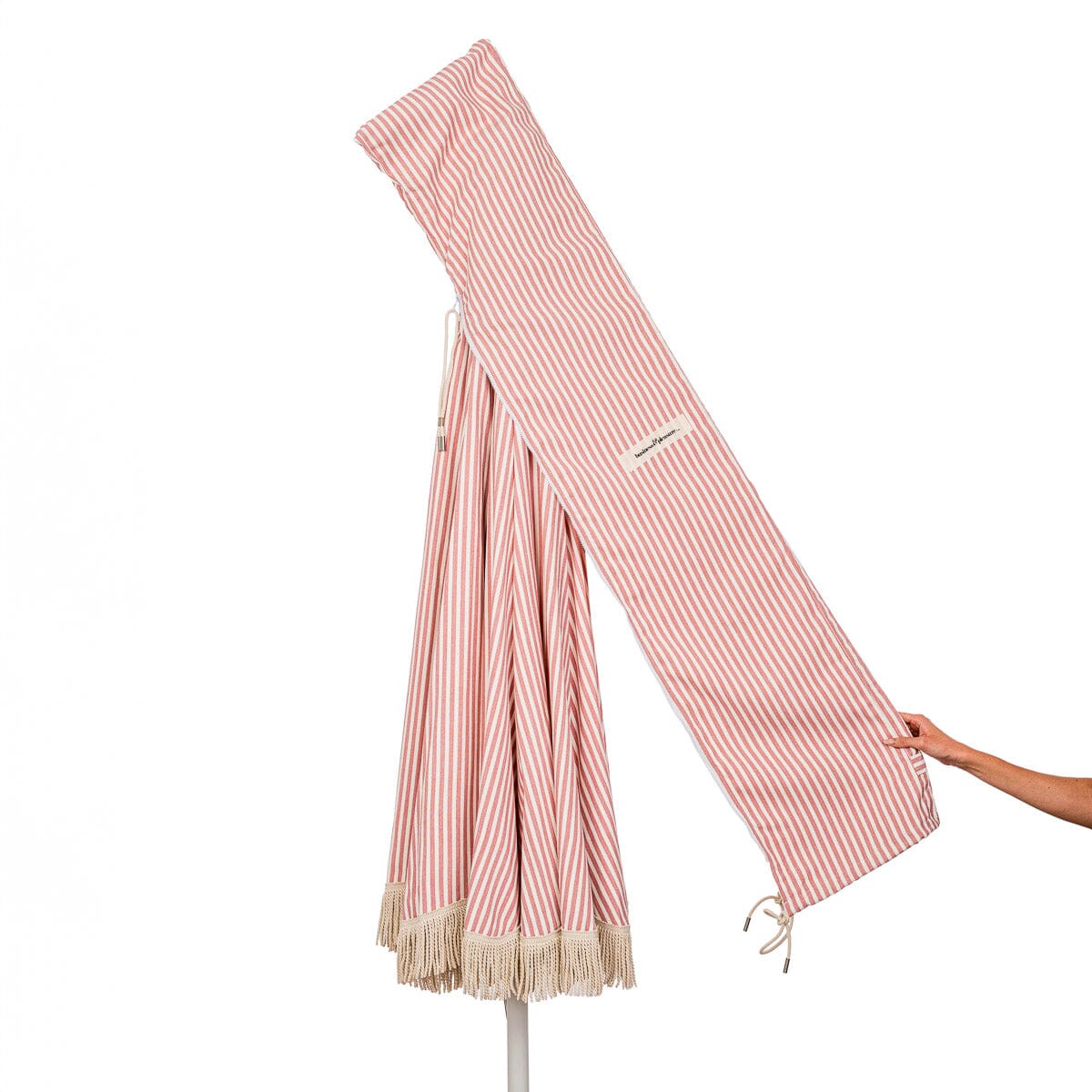 carry bag detail of pink stripe patio umbrella