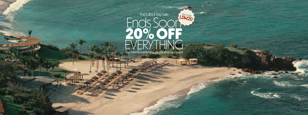 Aerial beach scene with turquoise ocean, sandy shore, lounge chairs, palm trees, and large promotional text reading 'Ends Soon 20% OFF EVERYTHING' plus a 'LOWES' logo.