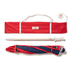 Red and navy beach umbrella on a white background