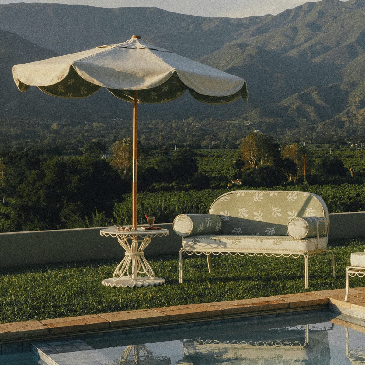 The Al Fresco Love Seat in Benoît Jade Green Jacquard | Antique White Frame Bundle Business & Pleasure Co. 