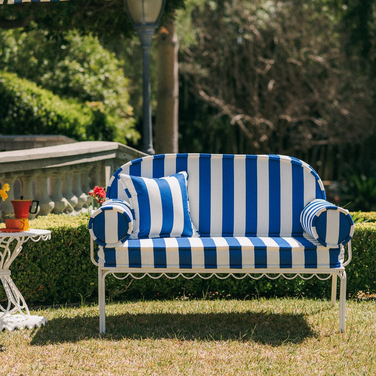 The Al Fresco Love Seat in Crew Mediterranean Blue Stripe | Antique White Frame Bundle Business & Pleasure Co. 