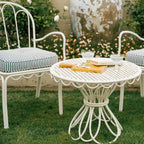Navy al fresco chairs in a garden