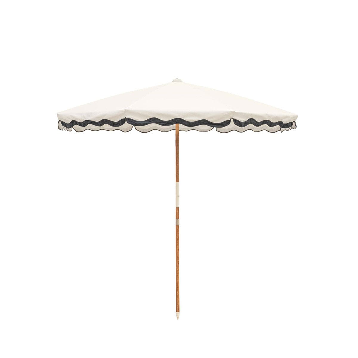 White beach umbrella with dark navy trim on a white background