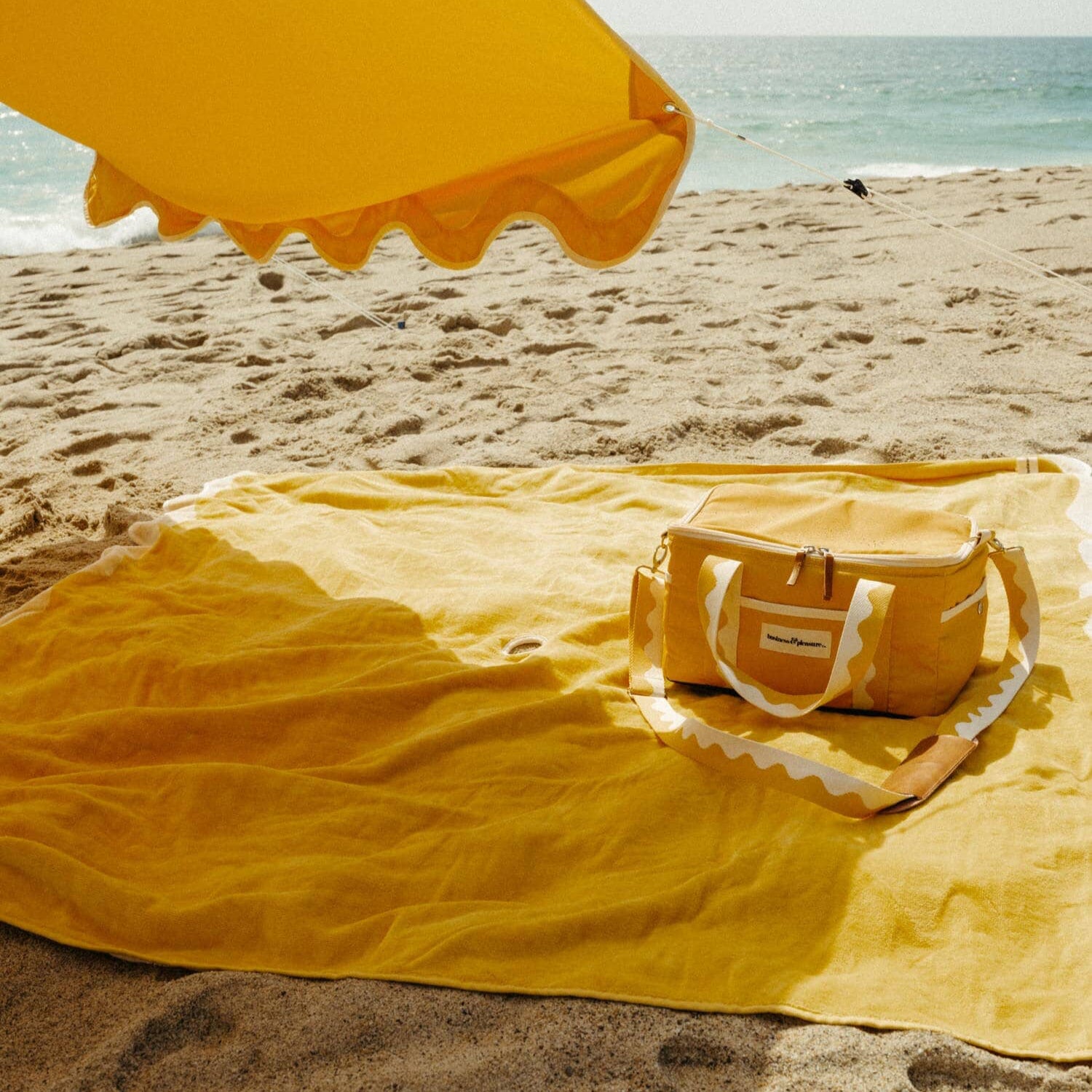 riviera mimosa blanket, tent and cooler on the beach