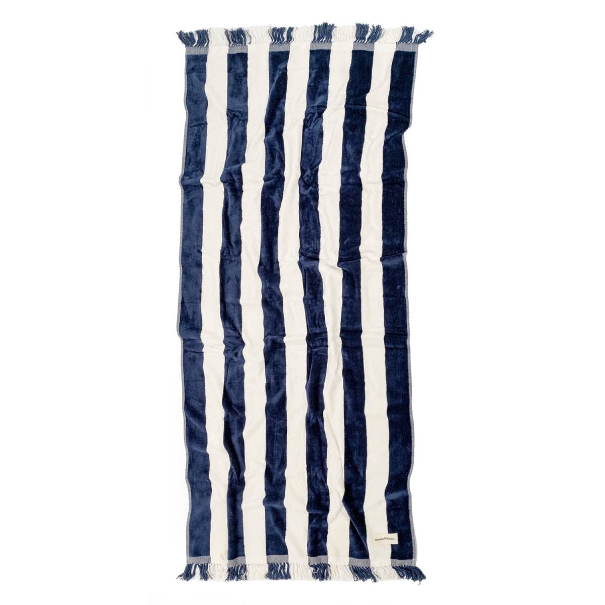 studio image of navy capri stripe holiday beach towel