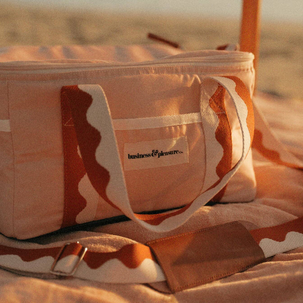 beach setting with riviera pink cooler bag