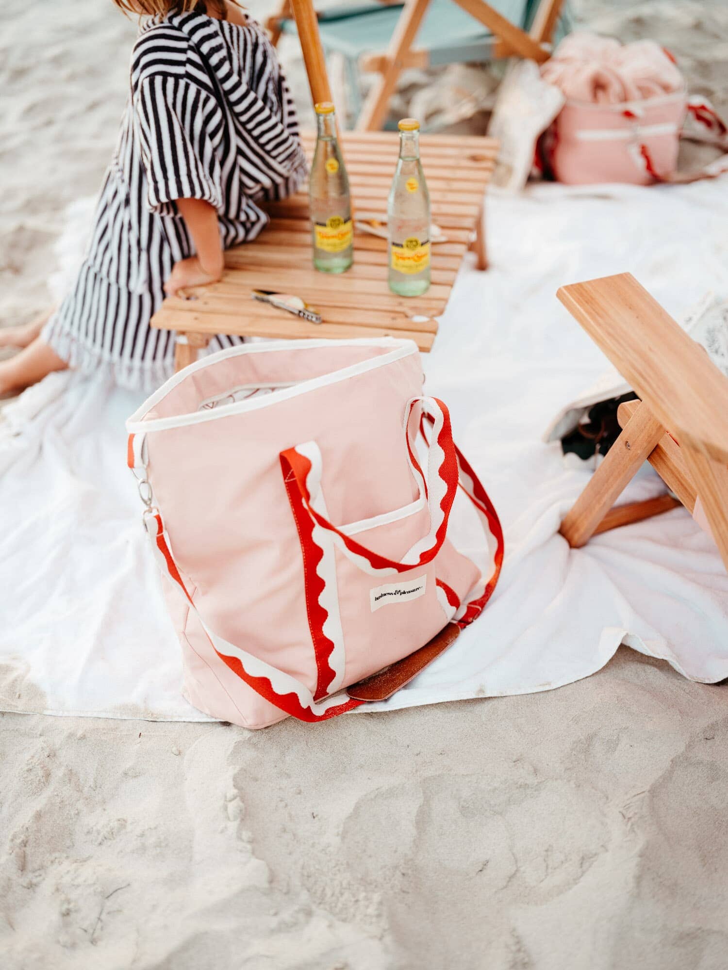 Rivie pink cooler tote with a picnic set up