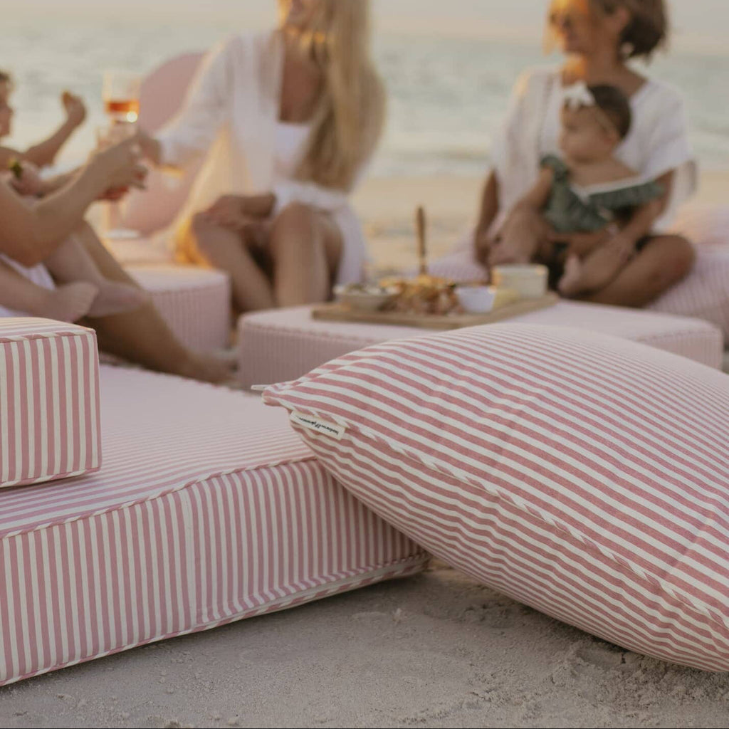 beach picnic with the laurens pink stripe cushion collection