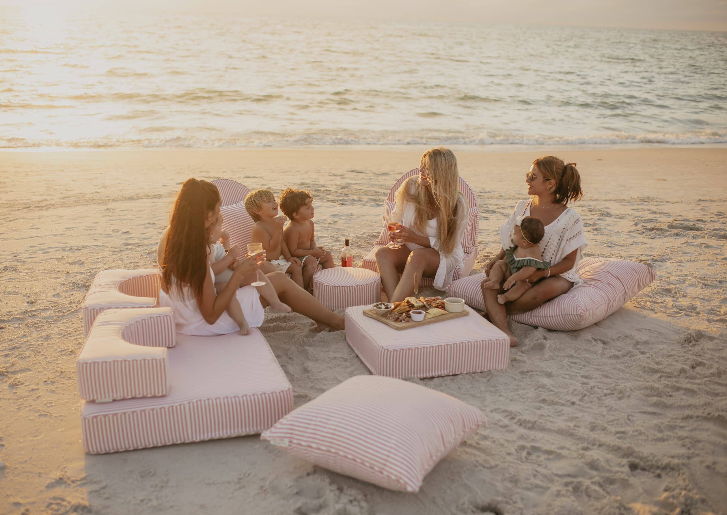 beach picnic with the laurens pink stripe cushion collection