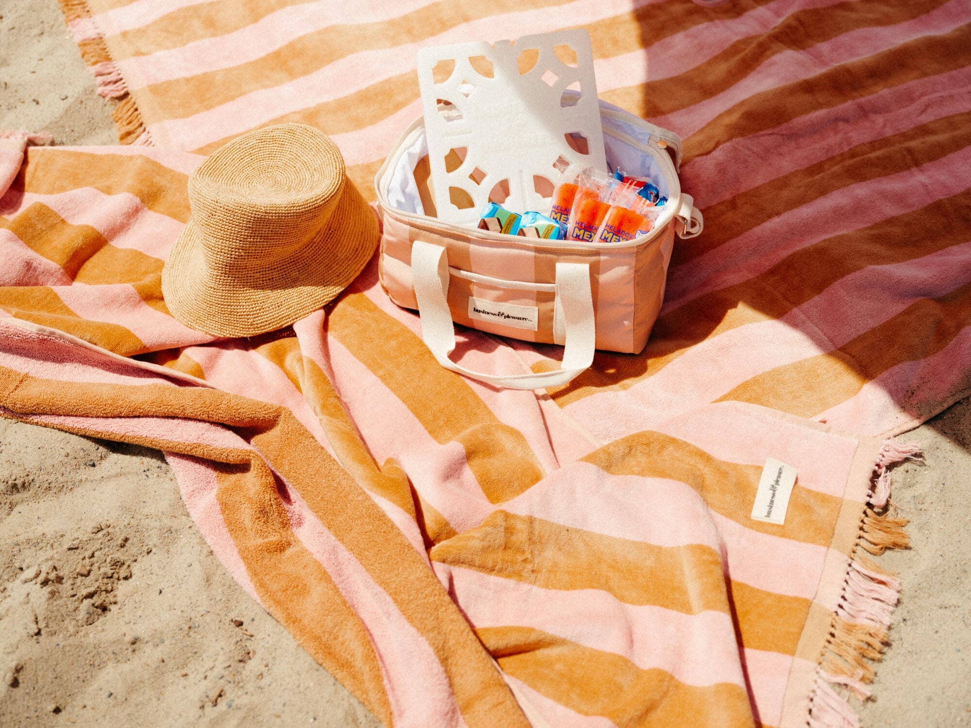 70s panel sand blanket, towel and cooler on the beach