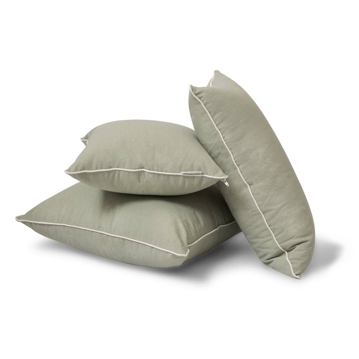 Studio image of stack of green pillows
