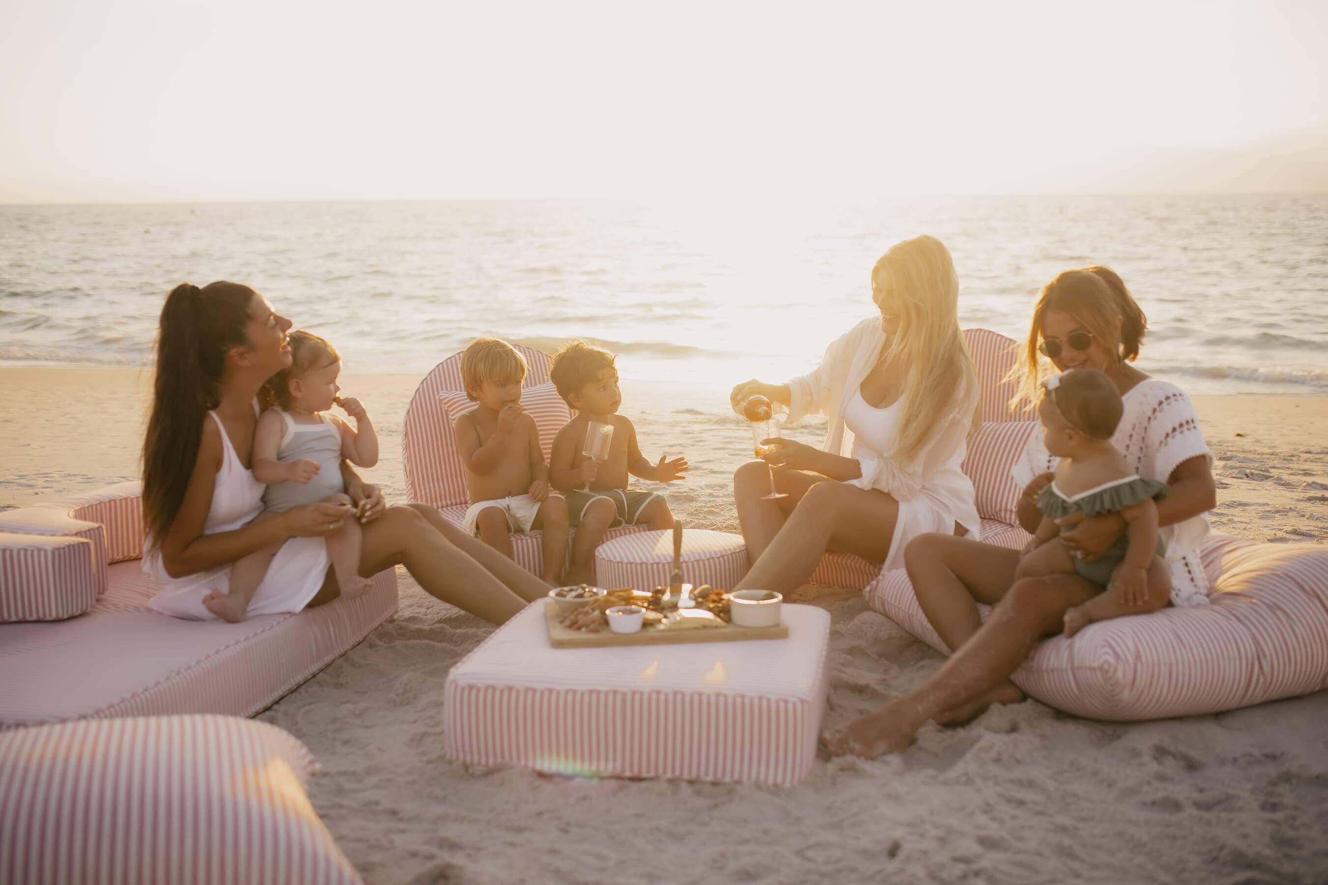 beach picnic with pink stripe modular pillow stack