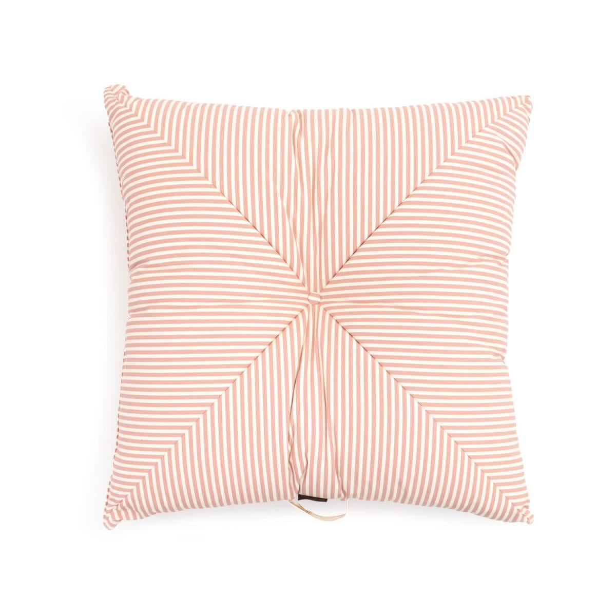 Overhead image of pink floor pillow