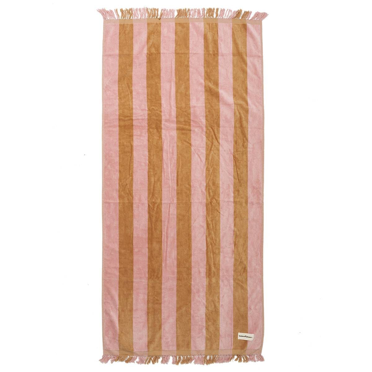 Studio image of sand pink beach towel