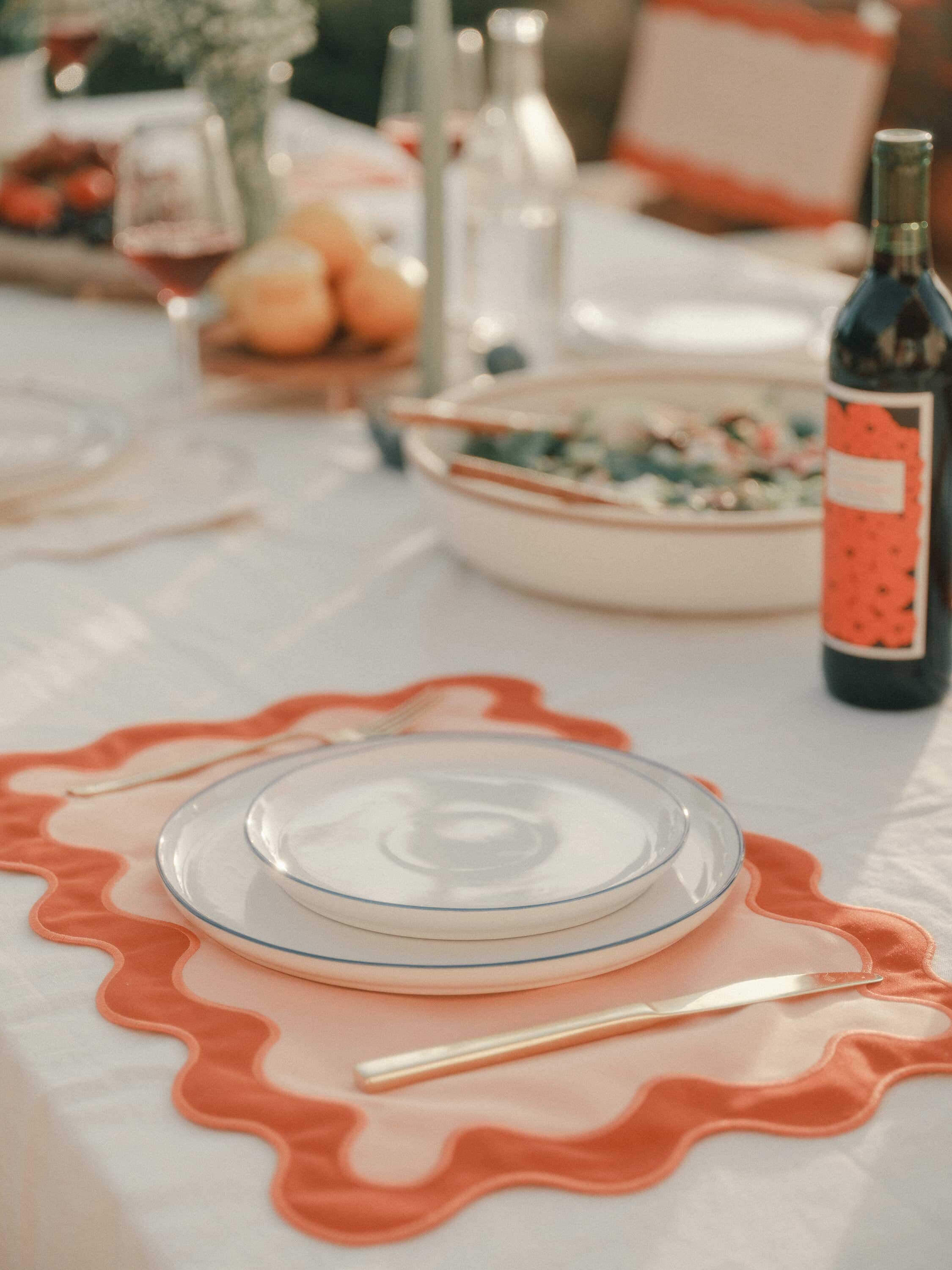 table setting with table cloth and placemat
