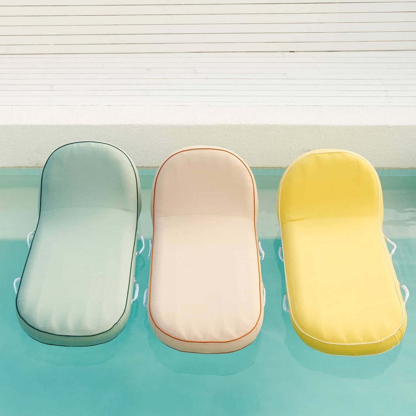 Pool loungers in the pool