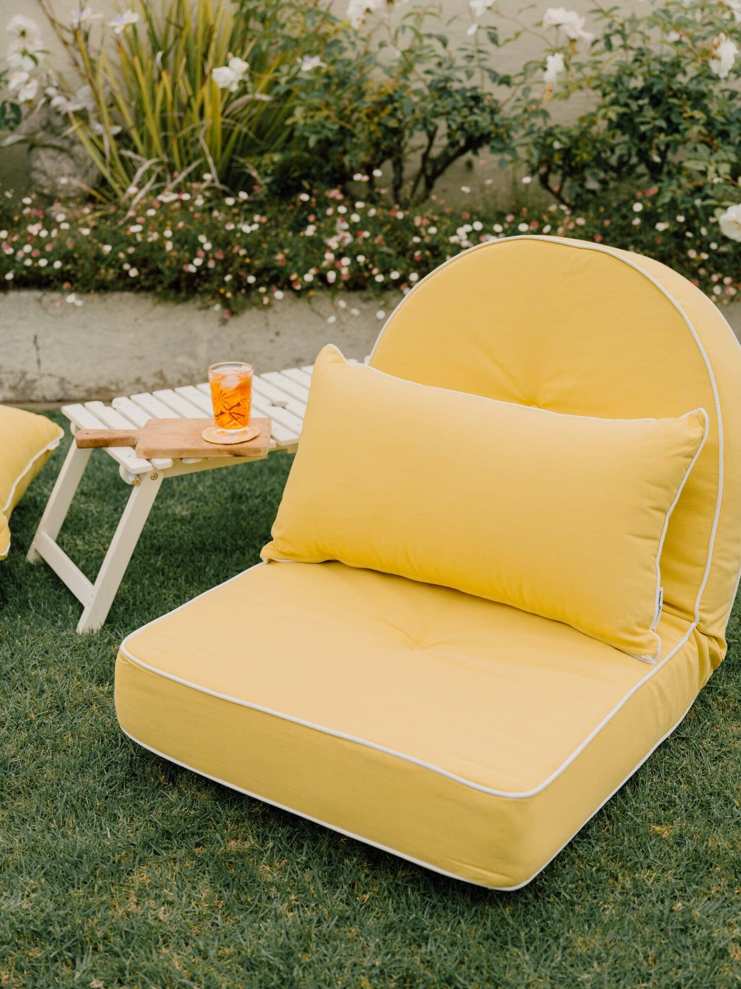 Riviera mimosa lounger in a garden setting