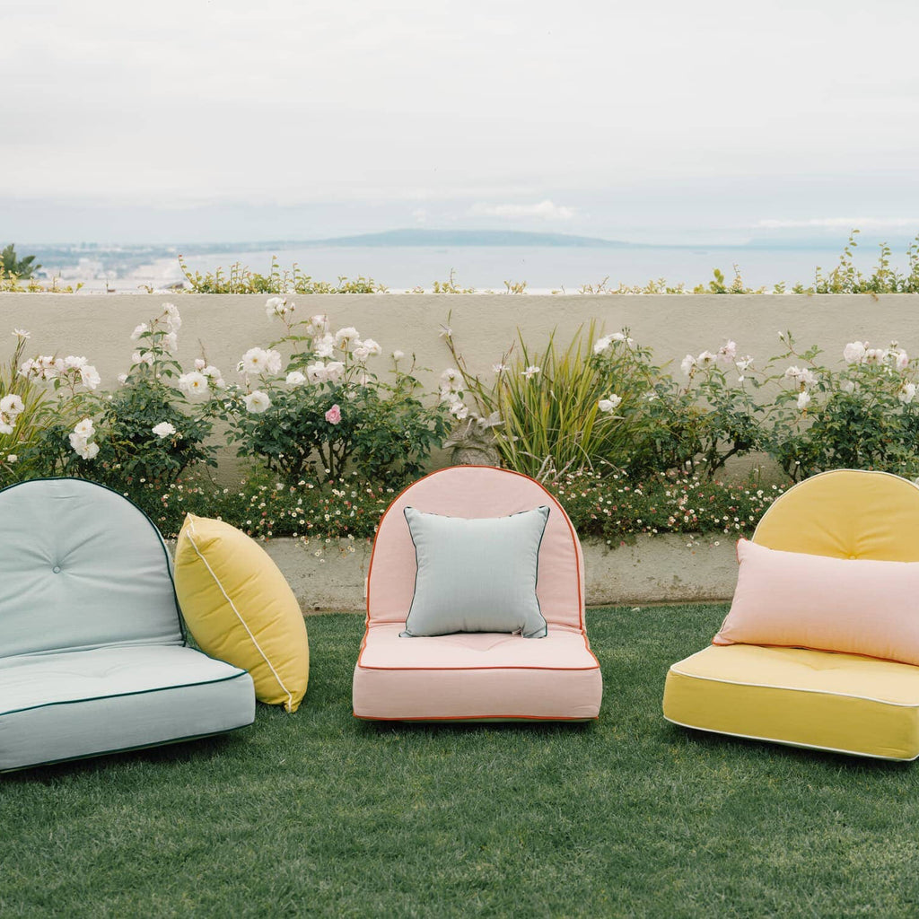 Reclining loungers in a garden setting