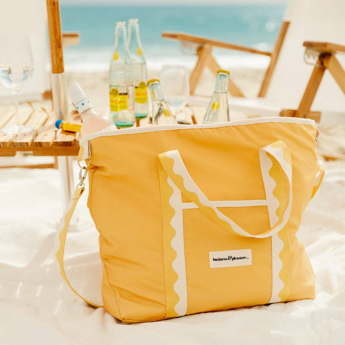 Riviera mimosa cooler tote on the beach