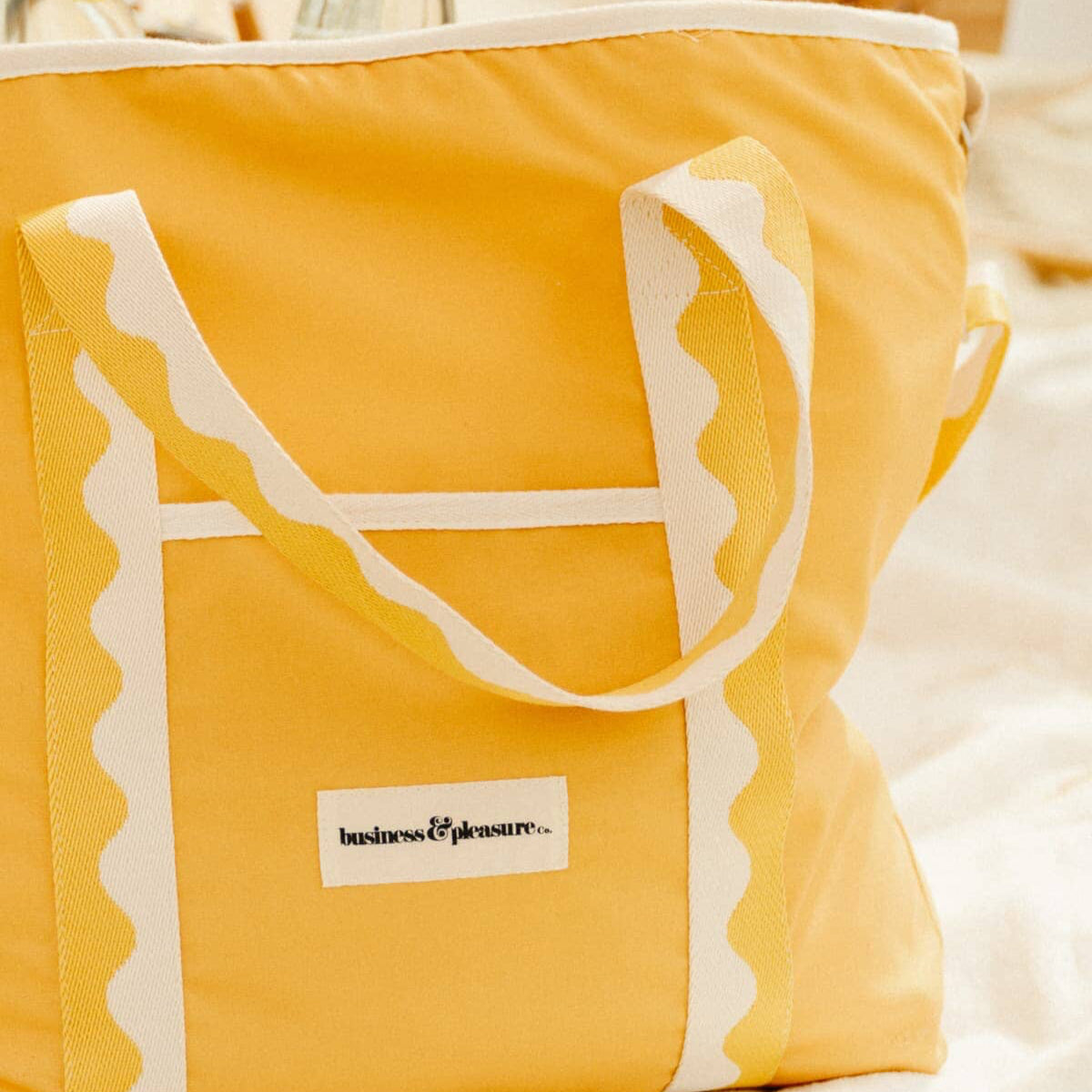 Riviera mimosa cooler tote on the beach