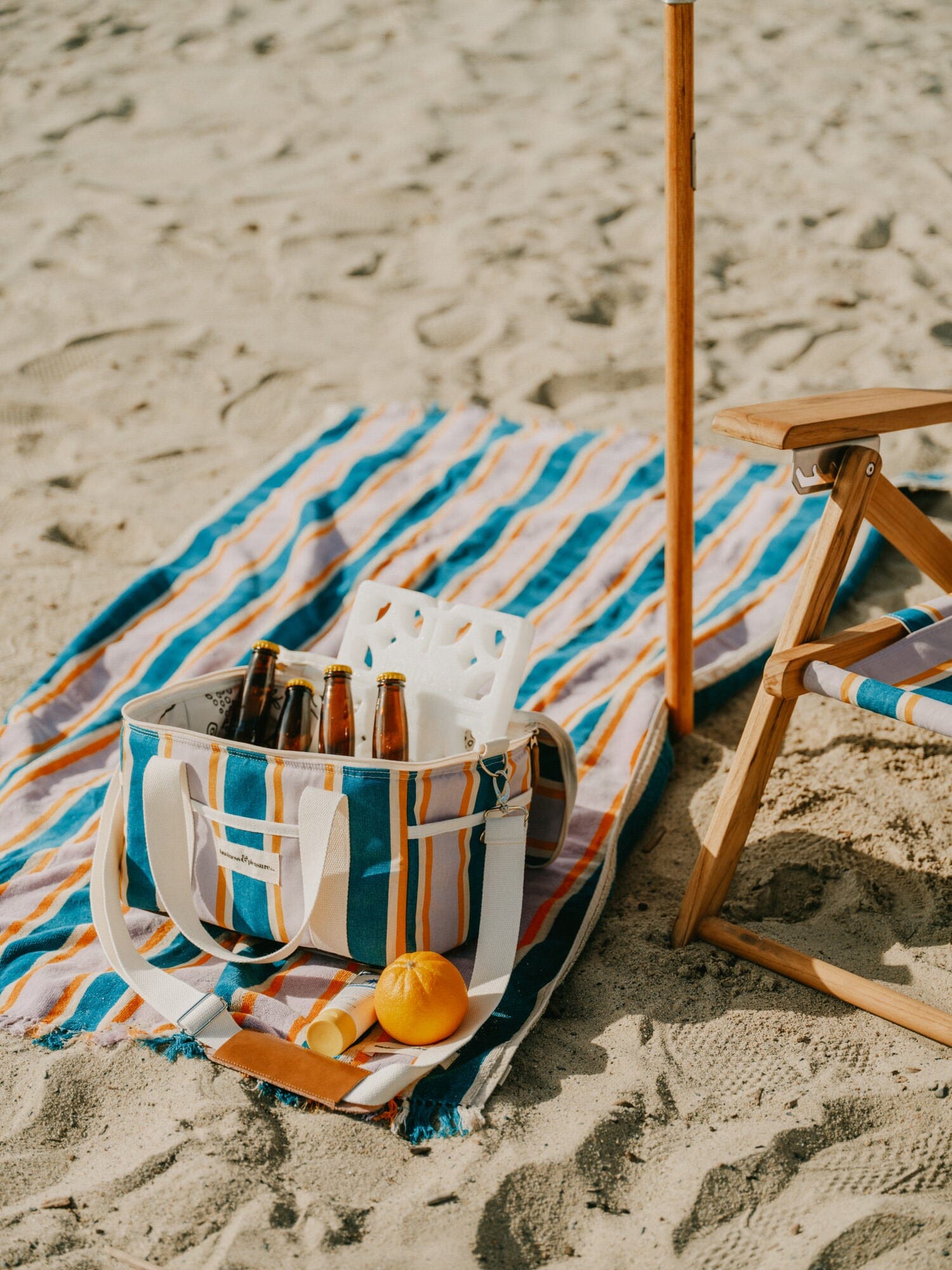 Beach set up with Smallable chair, towel & cooler
