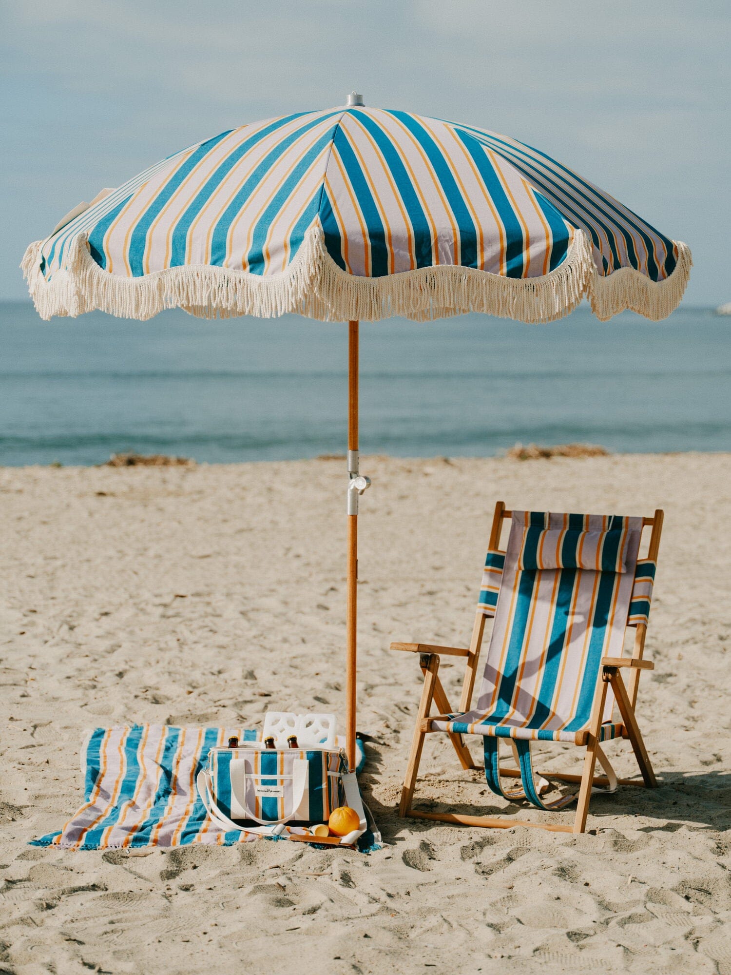 Beach set up with Smallable umbrella, chair and accessories