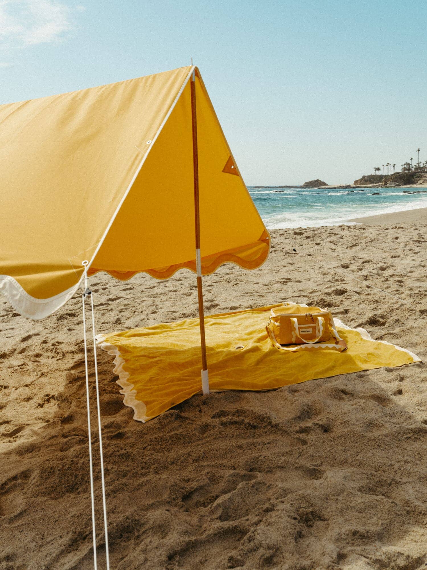 Riviera mimosa tent on the beach with matching accessories